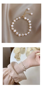 Detailed macro view of 14K gold plated baroque pearl bracelet with adjustable slider clasp