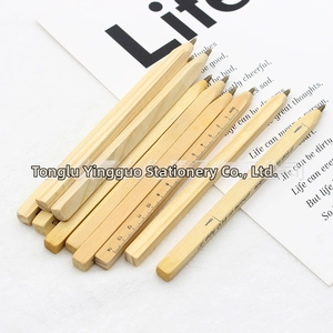 Detail of wooden pencils with integrated 15cm ruler scale and natural wood grain texture