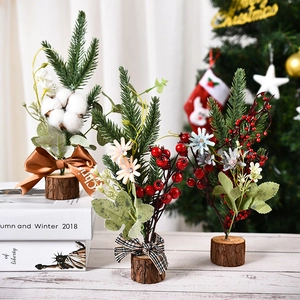 Mini Christmas tabletop trees with red berries and cotton on wood bases for decor