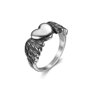 Vintage stainless steel heart ring with engraved wings in punk gothic biker style
