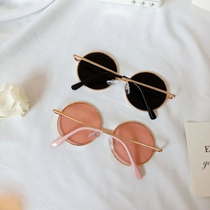 Retro round metal frame kids sunglasses in pink and black with UV protection