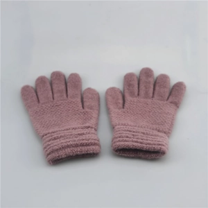 Detailed view of pink knitted winter gloves featuring ribbed cuffs for children