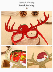 Detailed close-up of Christmas reindeer horn glasses frame with felt and glitter fabric