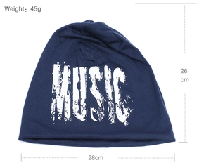 Detail of navy blue knit beanie featuring white MUSIC print and size dimensions