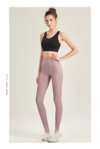 Vue détaillée du legging de yoga rose à taille haute avec perforations laser pour la respirabilité