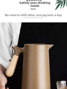 Detail of 1L Nordic coffee pot featuring a matte brown finish and wooden texture handle