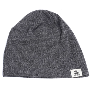 Détail de la texture tricotée et logo Tunboy sur le bonnet gris chiné unisexe