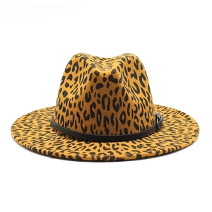 Detail of leopard print fedora hat featuring black leather band and silver metal buckle