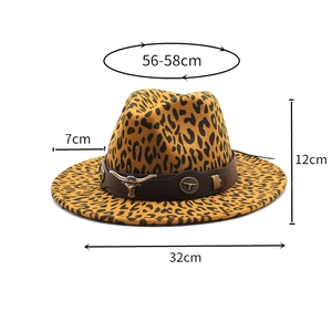 Detail of leopard print fedora hat with brown leather band and metallic bull head icon