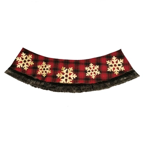 Plaid Christmas tree skirt with golden snowflake patterns and faux fur trim on white background