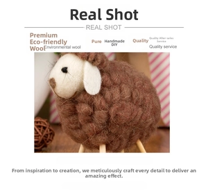 Detail of handmade wool felt sheep ornament with natural wood stand and eco-friendly texture