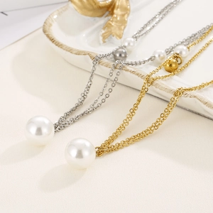 Elegant gold and silver stainless steel layered necklaces with large white pearl pendants