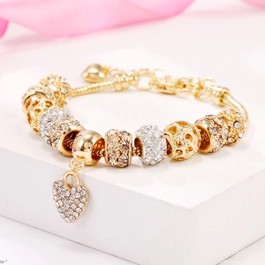 Gold-plated alloy charm bracelet with sparkling heart pendant on a snake chain