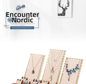 Bamboo jewelry display tray set with beige velvet inserts for earrings and necklaces