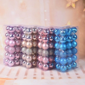 Detail of assorted Christmas ball ornaments in multiple finishes and festive colors