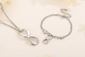 Silver infinity symbol jewelry set with necklace and double-layer heart bracelet