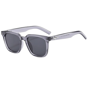 Trendy square sunglasses with grey transparent frame and silver star detail in 45-degree view