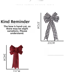 Detail view showing large plaid decorative bows in red and black and white patterns