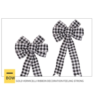 Close-up of black and white plaid polyester bows for Christmas tree and gift decoration