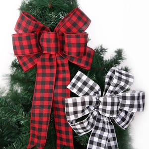 Classic red and white buffalo plaid Christmas tree bows for holiday decoration