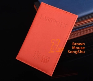 Close-up of embossed PASSPORT lettering and neat stitching on premium PU leather covers