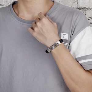 Men's retro braided black leather bracelet with silver stainless steel clasp on wrist