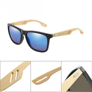 Macro view of blue mirrored lenses with natural bamboo wood arms on black frame sunglasses