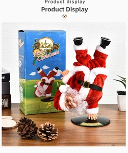 Babbo Natale elettrico danzante in verticale con confezione regalo blu festiva