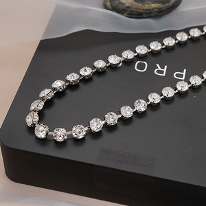 Sparkling silver tennis choker necklace with clear round zircons in a classic claw setting