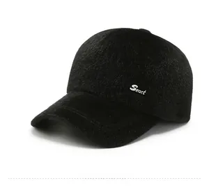 Detail view of the plush black winter baseball cap featuring white Sport embroidery