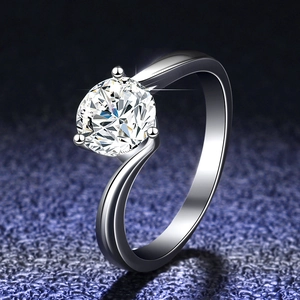 Macro shot of s925 sterling silver moissanite ring with S-curve band and 4-prong setting