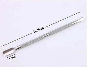 Detailed view of dual-ended stainless steel nail cuticle pusher with anti-slip handle