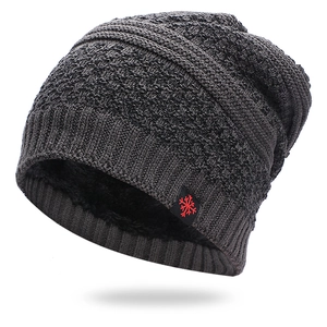 Thick warm dark grey knitted beanie with fleece lining and snowflake label for outdoors