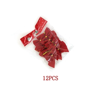 Close-up of 12 red velvet Christmas tree bows in transparent retail packaging with card