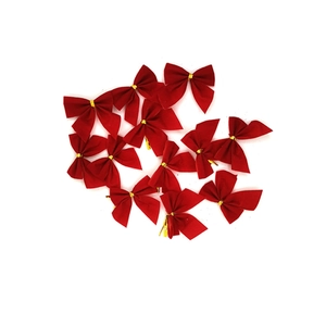 Detailed view of twelve red velvet Christmas bows with gold wire ties on white background