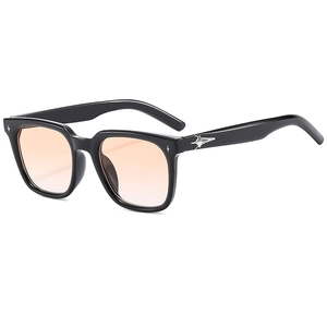 Trendy oversized square sunglasses with black frames and orange gradient lenses for summer