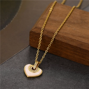 Titanium steel 18K gold heart necklace featuring white shell inlay and zircon accents