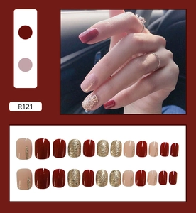 Detail view of burgundy and pink press-on nails set with glitter finish, model R121