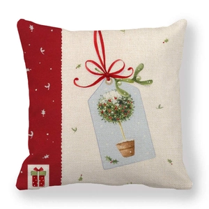 Detailed view of linen Christmas pillow cover featuring snowflake patterns and gift tags