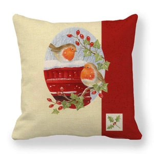 Close-up of Christmas linen cushion cover featuring robins on a snowy red mailbox