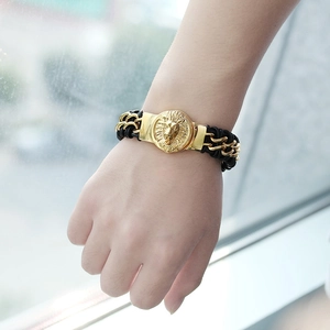Gold lion head men's bracelet with black woven leather and stainless steel chain links