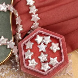 Star-shaped natural freshwater pearls in pink-white hue displayed in a luxury jewelry box