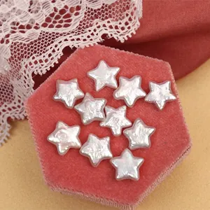 Lustrous star-shaped freshwater pearls displayed on a pink velvet box for jewelry making