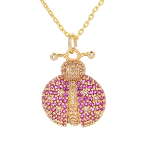 Golden ladybug pendant necklace with sparkling pink and champagne micro-pave crystals