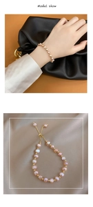 Close-up of baroque pink freshwater pearl bracelet with 14K gold plated adjustable chain