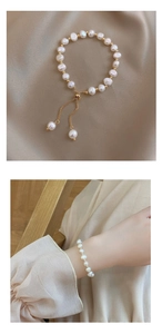 Detail of 14K gold plated baroque pearl bracelet with adjustable sliding drawstring clasp