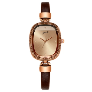 Elegant rose gold oval watch for women with brown leather strap and sparkling crystal bezel