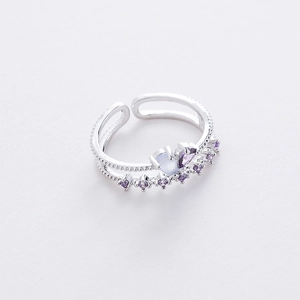 Detail of silver crown ring with purple heart crystal and micro-pave cubic zirconia