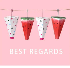 Detail of cone-shaped umbrella candy boxes with watermelon and polka dot patterns