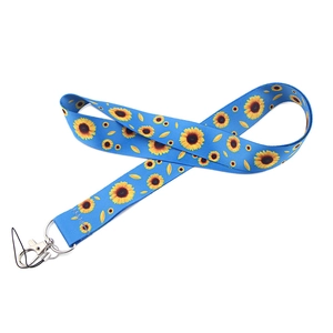 Blue fabric lanyard with yellow sunflower patterns and a metal lobster clasp hook
